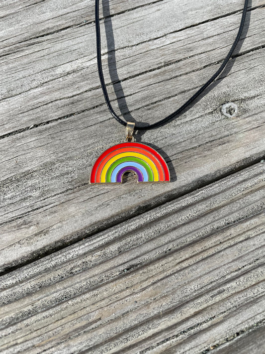 Close up of Rainbow necklace on deck