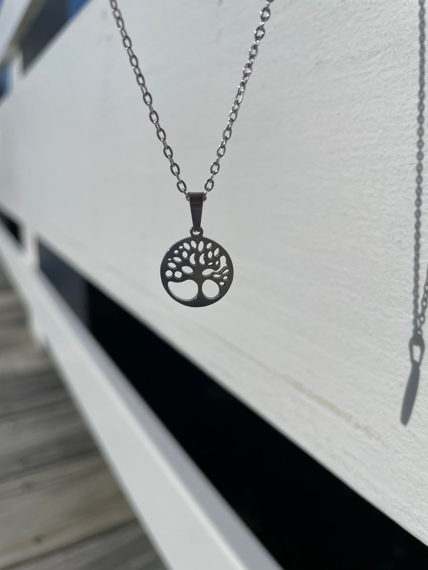 Tree of life necklace hanging